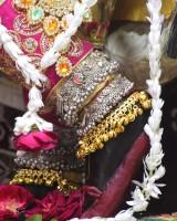 Radhaballav Ji Poshak Adorned with Elaborate Crown and Garlands