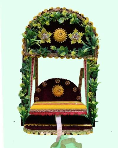 Ornate Laddu Gopal Jhula With Greenery & Yellow Flowers