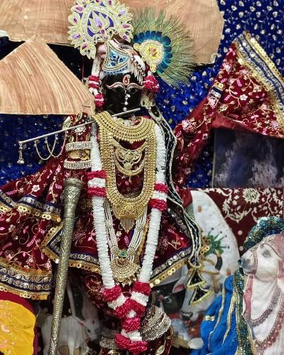 Beautiful Marron Poshak for Radhaballav Ji with Intricate Embroidery and Garland