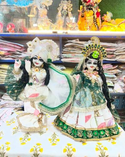 Beautiful Radha Krishan Poshak For Hariyali Teej In White And Green Contrast With Lace Work