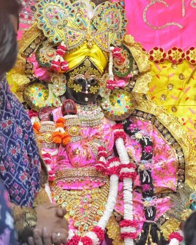 Radhaballav Ji in Pink and Yellow Outfit with Heavy Golden Jewelry