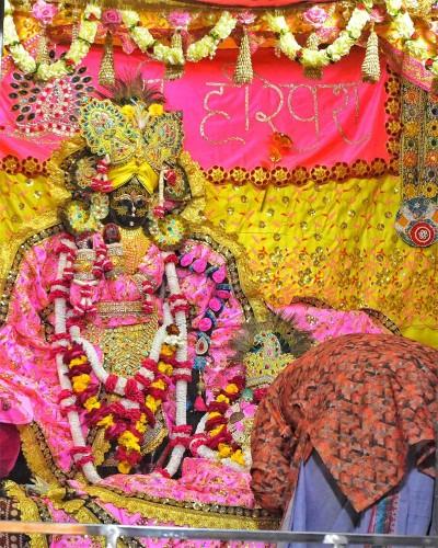 Radhaballav Ji Poshak in Bright Yellow Outfit with Vibrant Crown and Jewelry