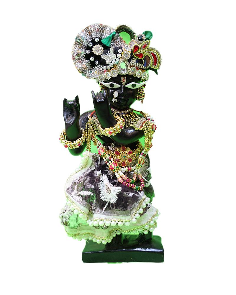 Black Marble Krishna Idol In White & Multicolor Attire With Intricate Embellishments