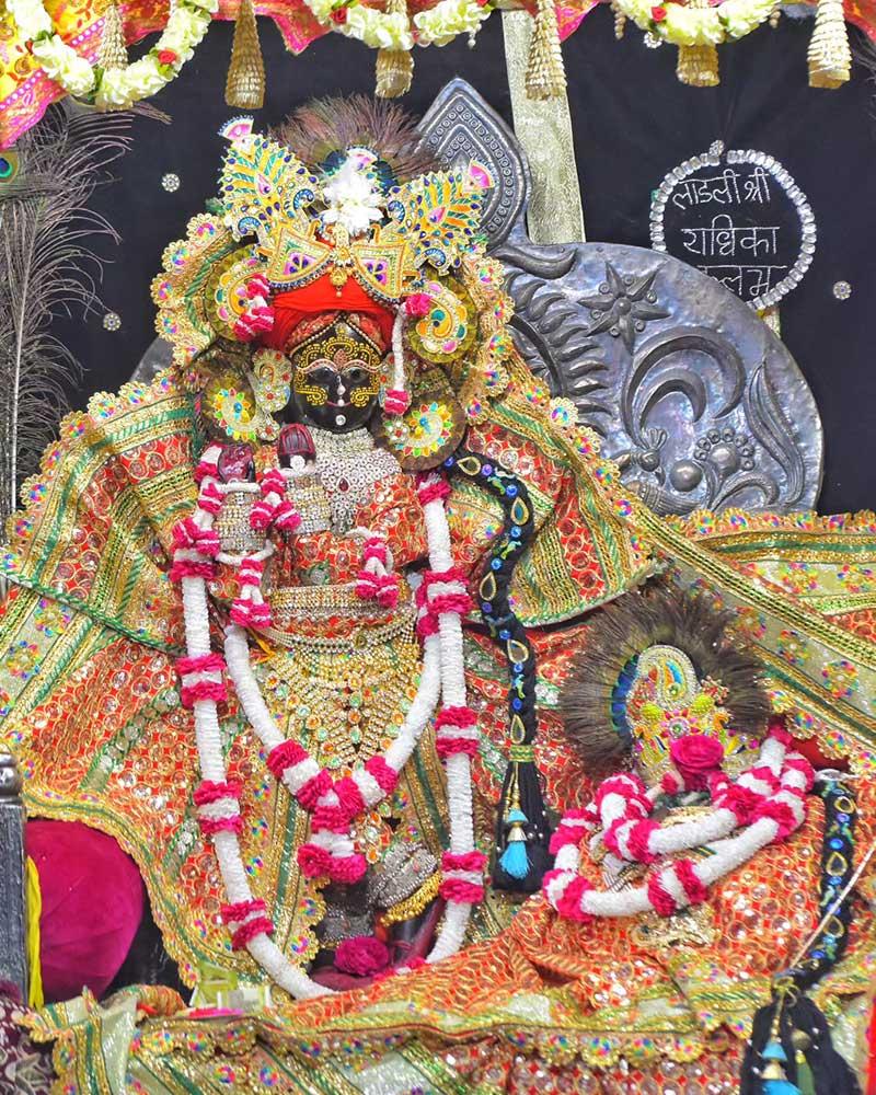 Radhaballav Ji Poshak Adorned with Elaborate Crown and Garlands Radhaballav Ji Poshak Adorned with Elaborate Crown and Garlands